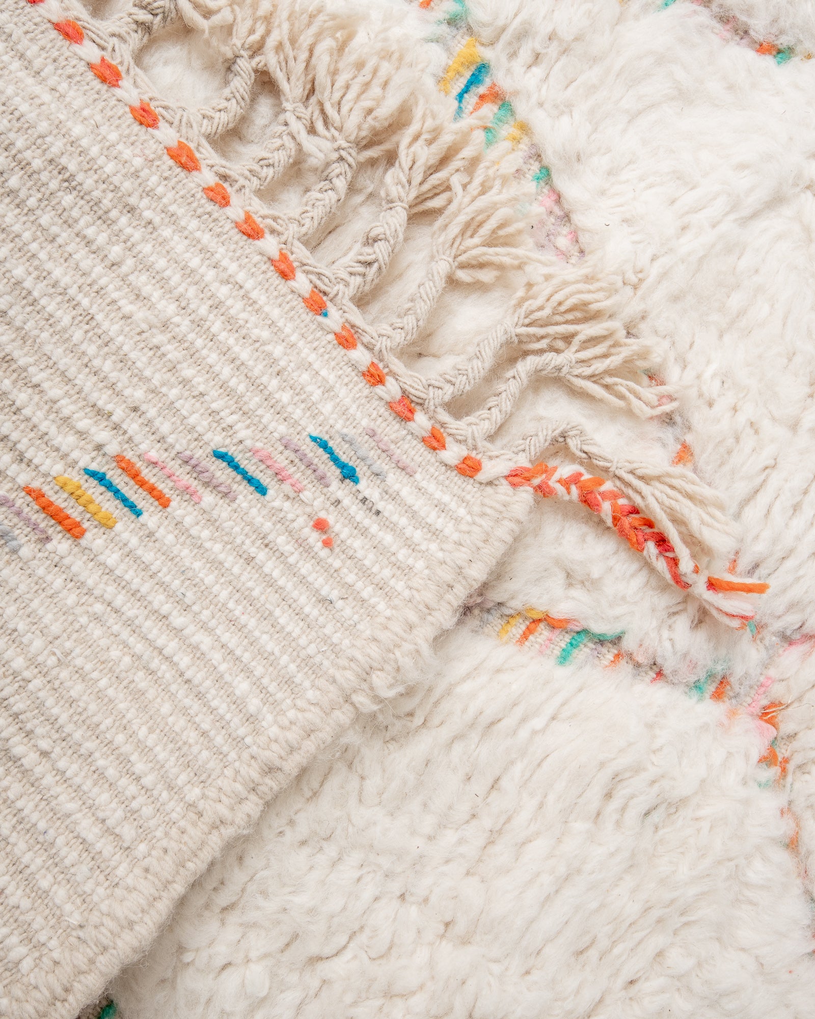 Modern, designer, handcrafted Berber rug from Morocco. Beniourain carpet with beautiful colours and patterns and fluffy wool texture.